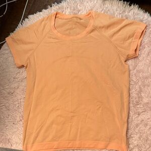 lululemon athletica Peach Short Sleeve Tee - swiftly tech waist length size 8